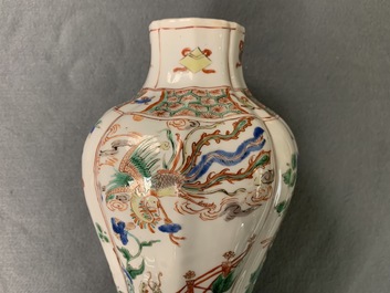 A Chinese famille verte vase and cover with mythical beasts, Kangxi