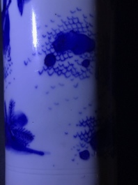 A Chinese blue and white rouleau vase with a figure in a landscape, Transitional period