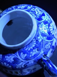 A Chinese blue and white reticulated double-walled teapot and two bowls, Transitional period