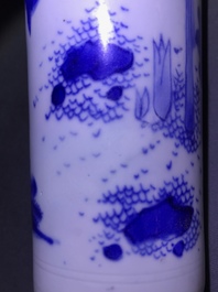 A Chinese blue and white rouleau vase with a figure in a landscape, Transitional period