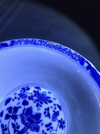 A Chinese blue and white reticulated double-walled teapot and two bowls, Transitional period