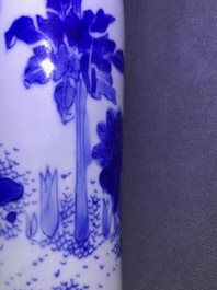 A Chinese blue and white rouleau vase with a figure in a landscape, Transitional period
