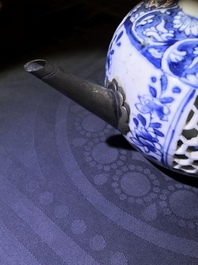 A Chinese blue and white reticulated double-walled teapot and two bowls, Transitional period