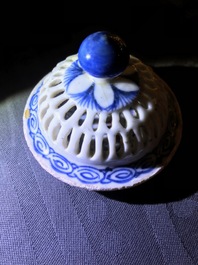 A Chinese blue and white reticulated double-walled teapot and two bowls, Transitional period