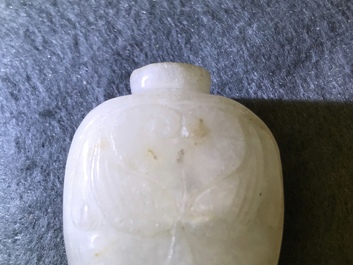 Two Chinese Mughal-style white and celadon jade snuff bottles, 19th C.