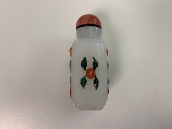 Two Chinese coral snuff bottles and one coral-embellished glass bottle, 19/20th C.