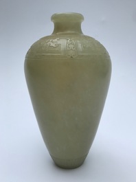 A Chinese light celadon jade relief-decorated meiping vase, 19/20th C.