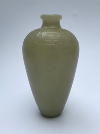 A Chinese light celadon jade relief-decorated meiping vase, 19/20th C.