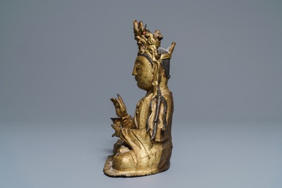 A Sino-Tibetan gilt bronze figure of Buddha, Ming