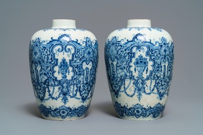 A pair of Dutch Delft blue and white Daniel Marot style vases, early 18th C.