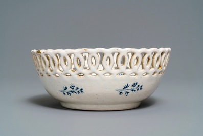 A blue and white Brussels faience '&agrave; la haie fleurie' reticulated basket, 18th C.