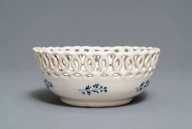 A blue and white Brussels faience '&agrave; la haie fleurie' reticulated basket, 18th C.