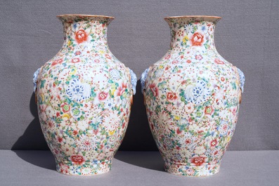 A pair of Chinese famille rose 'millefleurs' vases, Qianlong mark, Republic