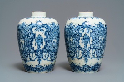 A pair of Dutch Delft blue and white Daniel Marot style vases, early 18th C.