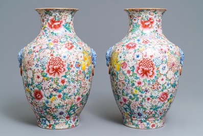 A pair of Chinese famille rose 'millefleurs' vases, Qianlong mark, Republic