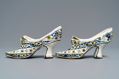 A pair of polychrome French faience lady's shoes, Lille, dated 1751