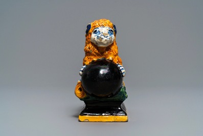 A black-enhanced polychrome Dutch Delft model of a lion, 1st half 18th C.