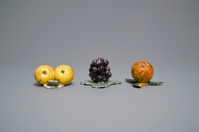 Six polychrome Dutch Delft models of apples, grapes and pears, 18th C.