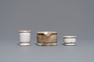 Six white Delft ointment jars and a small Raeren stoneware vessel, 16/17th C.