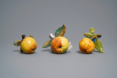 Six polychrome Dutch Delft models of apples, grapes and pears, 18th C.