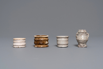 Six white Delft ointment jars and a small Raeren stoneware vessel, 16/17th C.