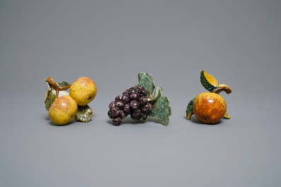 Six polychrome Dutch Delft models of apples, grapes and pears, 18th C.