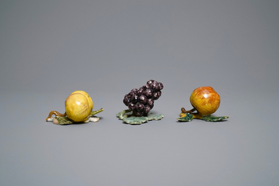 Six polychrome Dutch Delft models of apples, grapes and pears, 18th C.