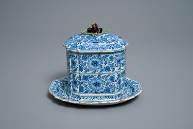 A rare Dutch Delft blue and white covered box with polychrome chestnut finial, 18th C.