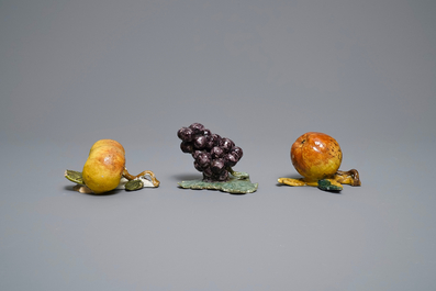 Six polychrome Dutch Delft models of apples, grapes and pears, 18th C.