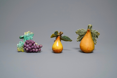 Seven polychrome Dutch Delft models of apples, grapes and pears, 18th C.