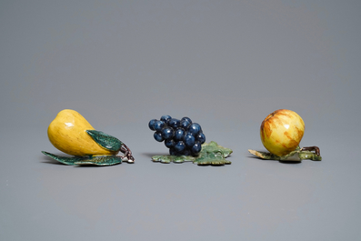 Six polychrome Dutch Delft models of apples, grapes and pears, 18th C.