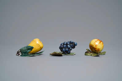 Six polychrome Dutch Delft models of apples, grapes and pears, 18th C.