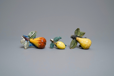 Five polychrome Dutch Delft models of apples, pears and a plum, 18th C.