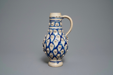 A large German stoneware jug with applied floral design, Westerwald, 17th C.