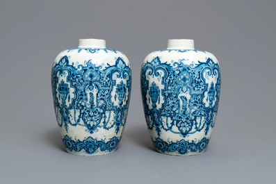 A pair of Dutch Delft blue and white Daniel Marot style vases, early 18th C.