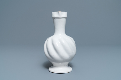 A white Dutch Delft gadrooned jug, 17th C.