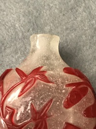 Five Chinese red overlay snowflake glass snuff bottles, 18/20th C.