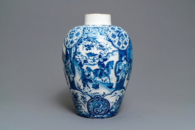 An exceptional and large Dutch Delft blue and white chinoiserie vase, 17/18th C.