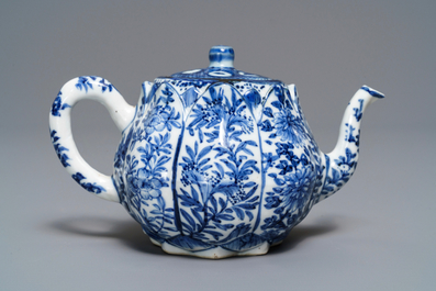 A Chinese blue and white relief-moulded 'lotus flower' teapot and cover, Kangxi