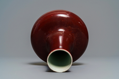 A Chinese monochrome red bottle vase, Kangxi