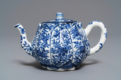 A Chinese blue and white relief-moulded 'lotus flower' teapot and cover, Kangxi