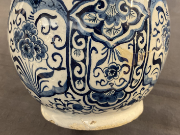 A Dutch Delft blue and white puzzle jug, dated 1737