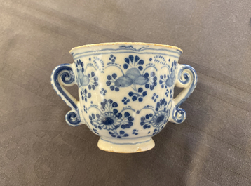 A Dutch Delft blue and white two-handled cup, 18th C.