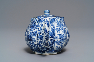 A Chinese blue and white relief-moulded 'lotus flower' teapot and cover, Kangxi