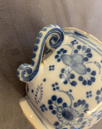 A Dutch Delft blue and white two-handled cup, 18th C.