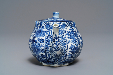 A Chinese blue and white relief-moulded 'lotus flower' teapot and cover, Kangxi