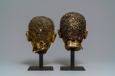 Two gilt-lacquered terracotta and stucco heads of Buddha, Thailand, Ayutthaya period, 18th C.