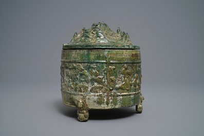 A Chinese green-glazed pottery tripod 'hill' jar, Han