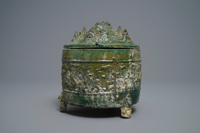 A Chinese green-glazed pottery tripod 'hill' jar, Han