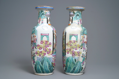 A pair of of Chinese famille rose rouleau 'court scene' vases, 19th C.
